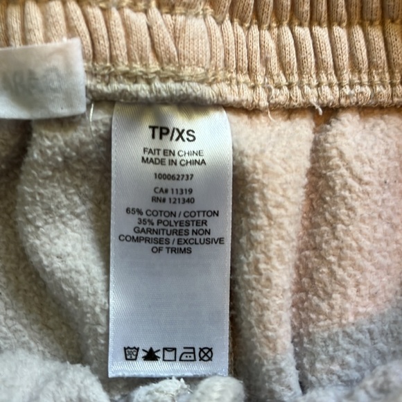 cream coloured x small t track suit from garage - Picture 3 of 3